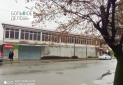 Здание вдоль проезжей части Новый район(1 круг)